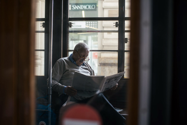 man newspaper San Paolo