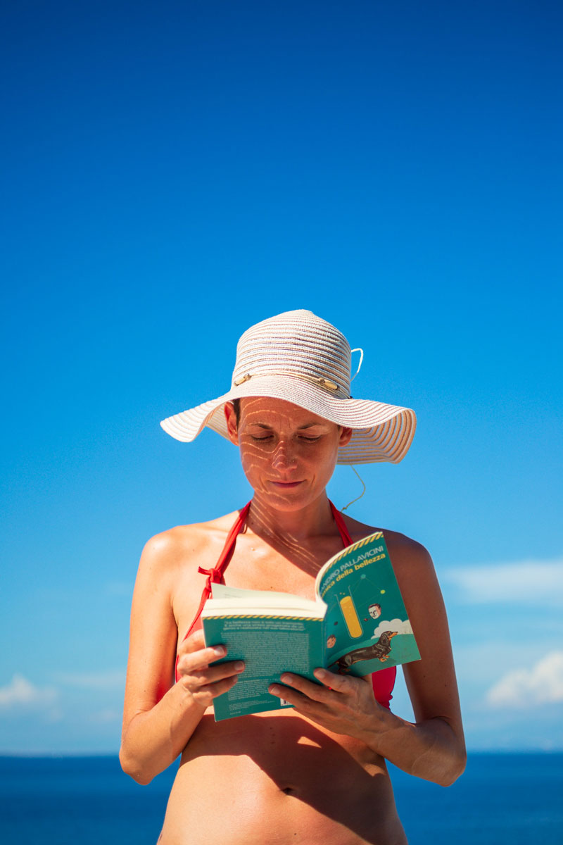 beach reader standing