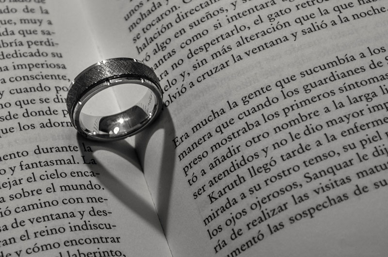 book with ring and shadow